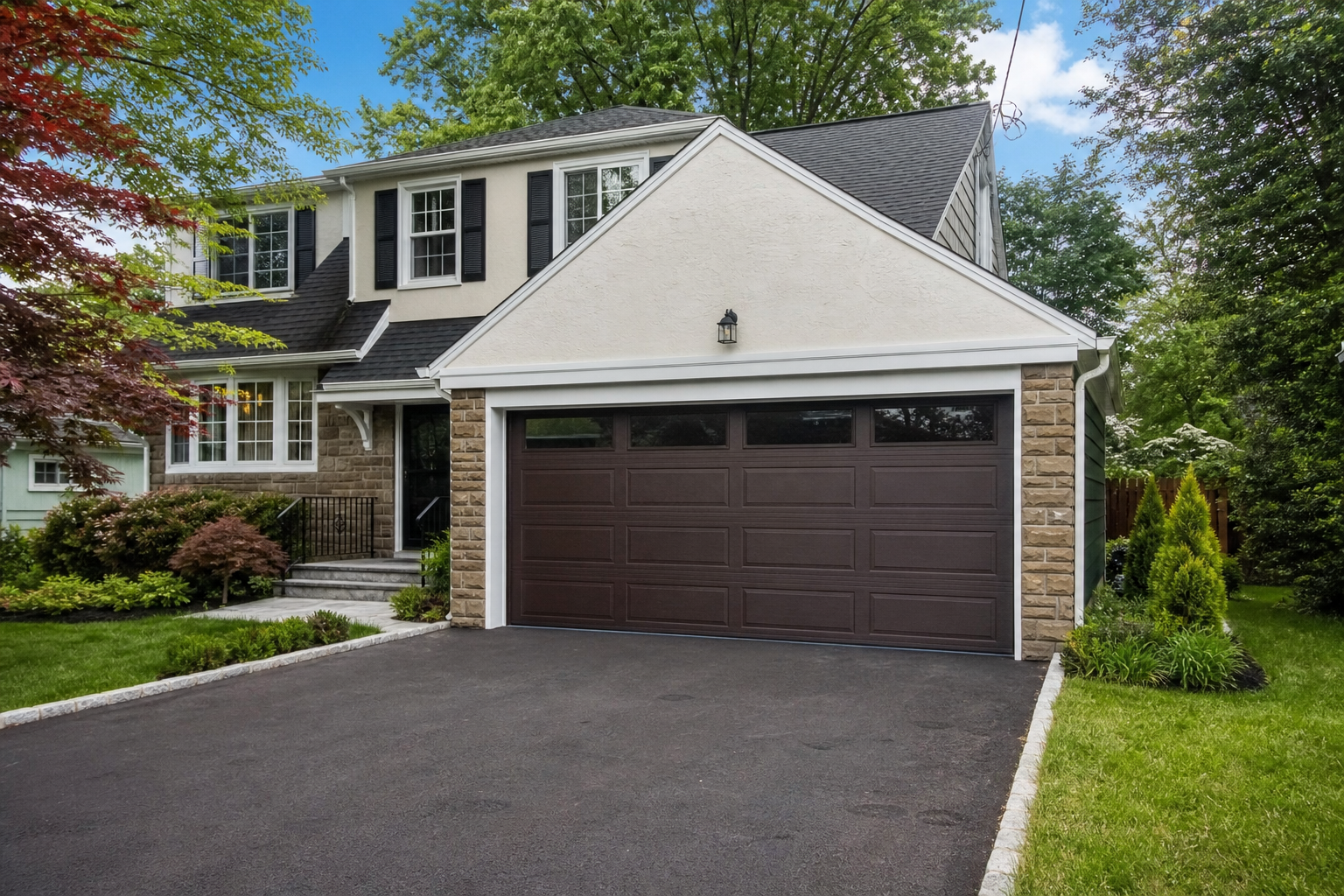 Newly installed garage door on a Teaneck, NJ home exterior
